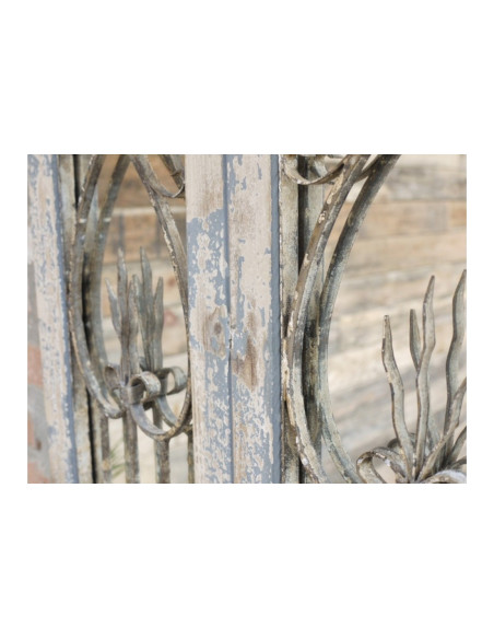 Grand miroir motif porte effet antique