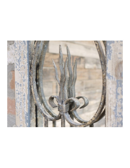 Grand miroir motif porte effet antique