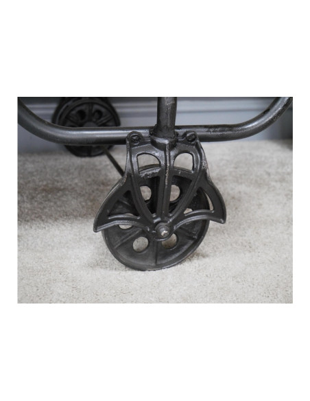 Table basse valise style indus en bois et verre sur roues