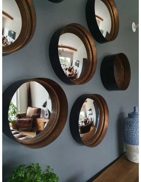 Miroir rond en métal noir intérieur cuivré