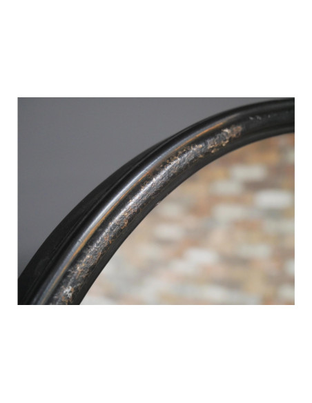 Miroir ovale sur chevalet industriel