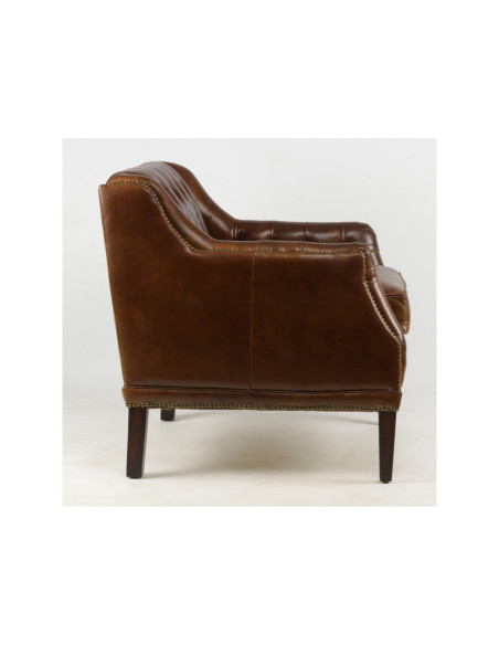 Fauteuil capitonné en cuir de vachette véritable
