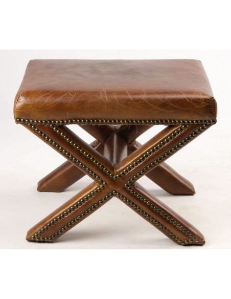 Pouf aux pieds croisés en cuir