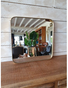 Miroir carré en métal doré...