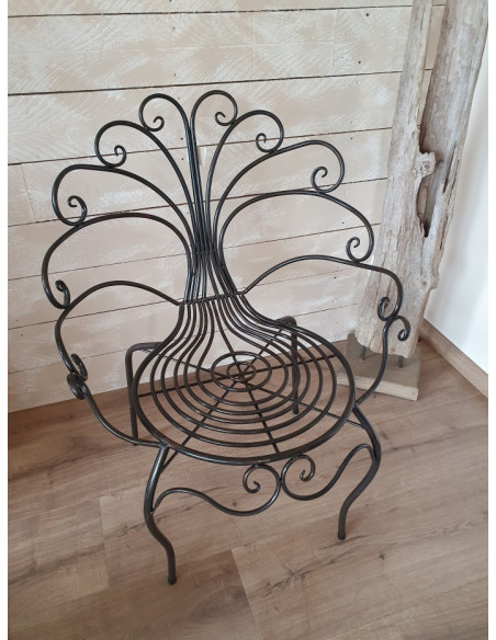 Fauteuil en forme de papillon en métal patine vieillie