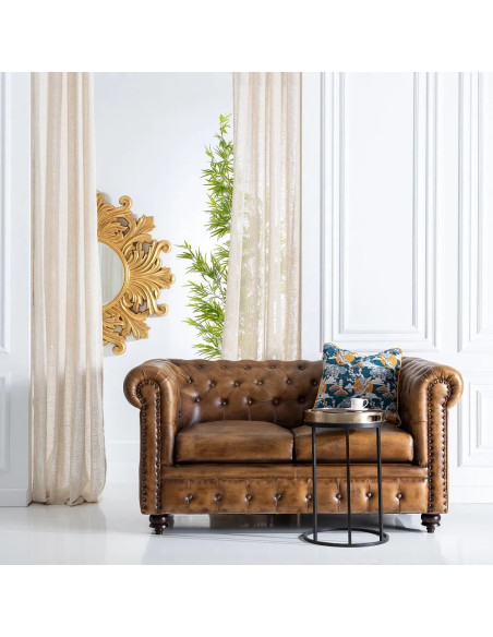 Canapé en cuir capitonné de style Chesterfield