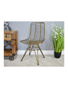 Chaise dorée en métal style...