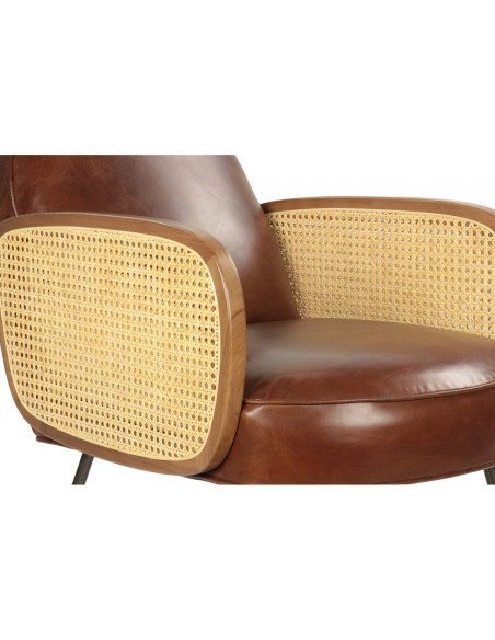Fauteuil en cuir aux accoudoirs en cannage style rétro