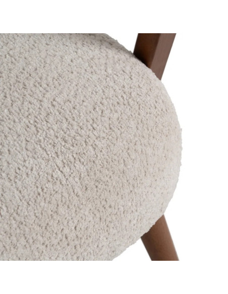 Fauteuil lounge en bois teinté d'hévéa et tissu bouclette