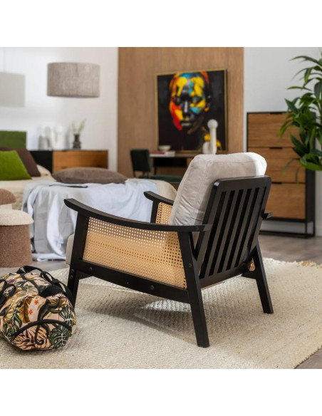 Fauteuil bergère en bois noir et rotin