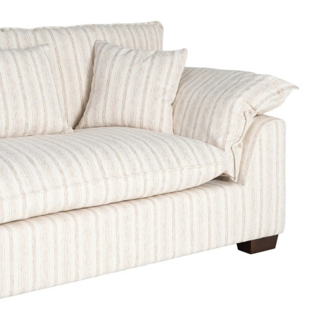 Canapé en tissu rayé avec coussins...