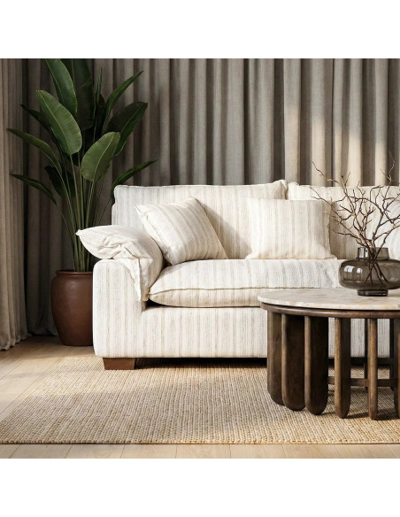 Canapé en tissu rayé avec coussins très confortable