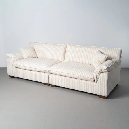 Canapé en tissu rayé avec coussins...