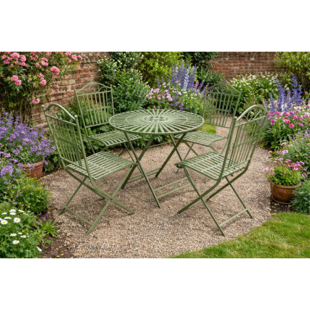 Table ronde avec quatre chaises en...