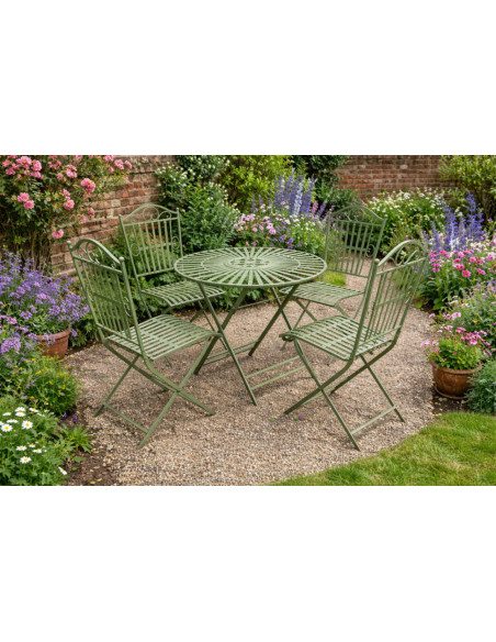 Table ronde avec quatre chaises en métal finition vert antique