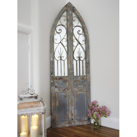 Grand miroir motif porte effet antique