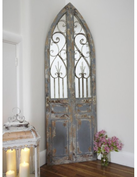 Grand miroir motif porte effet antique