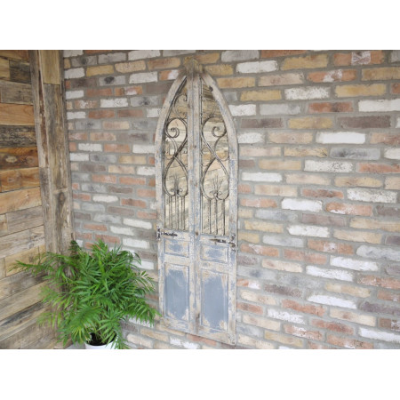 Grand miroir motif porte effet antique