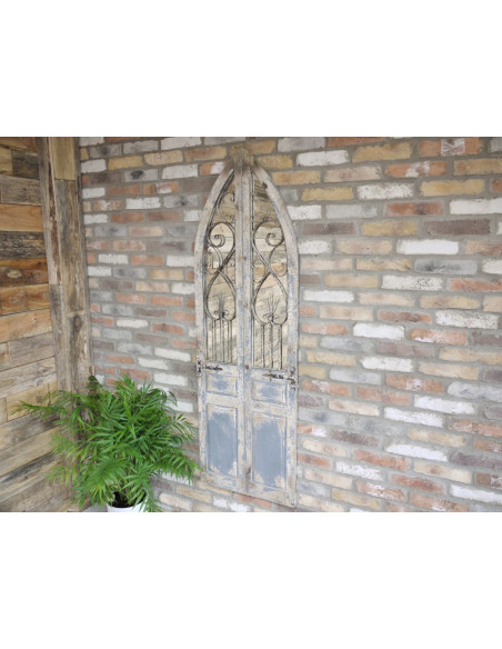 Grand miroir motif porte effet antique