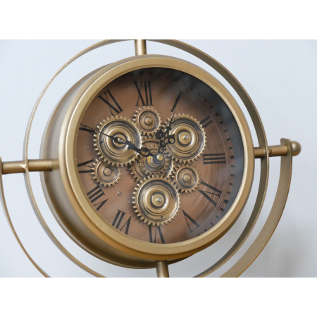 Horloge à engrenages mobiles dorée...