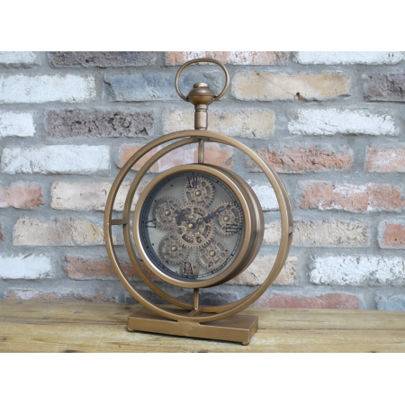 Horloge à poser dorée à engrenages...
