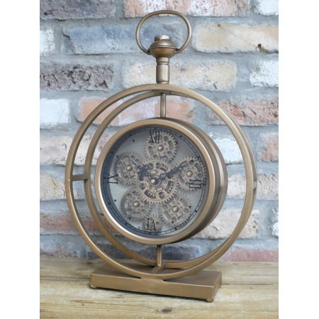Horloge à poser dorée à engrenages...