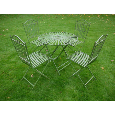 Table ronde avec quatre chaises en... Table ronde avec quatre chaises en...