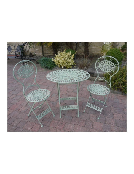 Table ovale avec deux chaises en métal effet vieilli