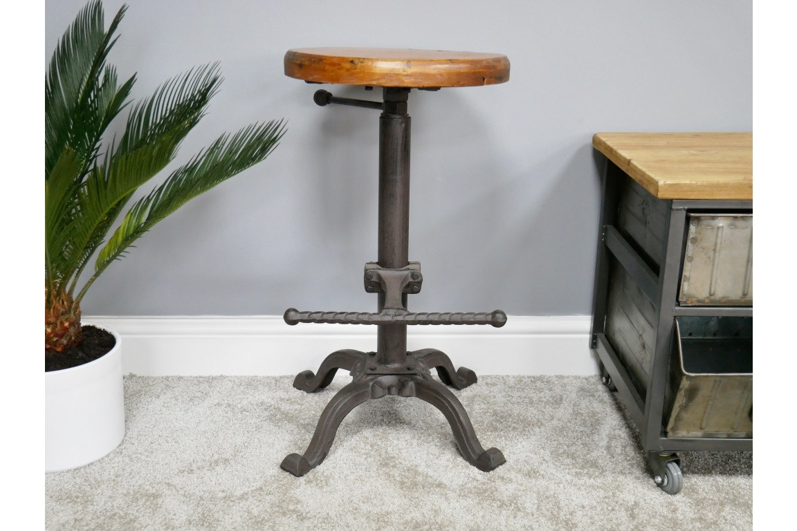 Tabouret réglable en fonte et assise bois