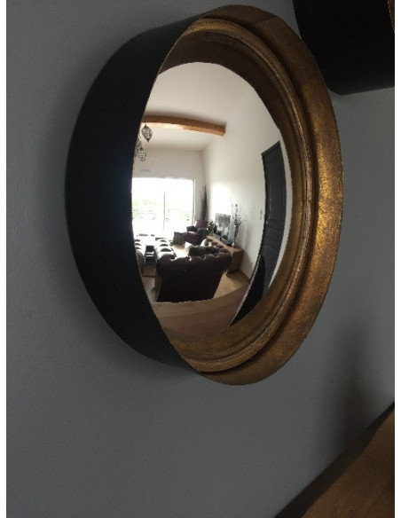 Miroir rond en métal noir intérieur cuivré