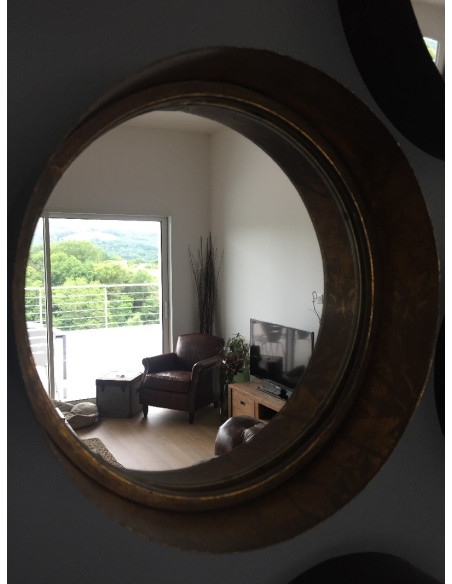 Miroir rond en métal noir intérieur cuivré